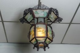 A PAIR OF CARVED WOOD AND PAINTED GLASS LANTERNS