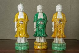 A GROUP OF THREE SANCAI GLAZED MODELS OF BUDDHAS