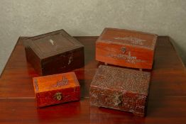 A GROUP OF FOUR WOOD BOXES