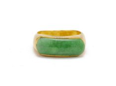A JADE AND GOLD RING
