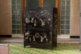A HARDSTONE INLAID BLACK LACQUER TV CABINET