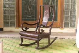 A MOTHER OF PEARL INLAID BLACKWOOD ROCKING CHAIR