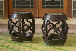 A PAIR OF MARBLE INSET HARDWOOD STOOLS