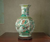 A LARGE FAMILLE VERTE HEXAGONAL PORCELAIN BOTTLE VASE