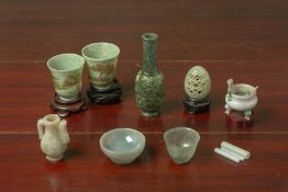 A GROUP OF ASSORTED JADE OBJECTS