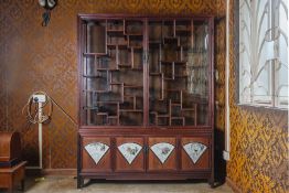 A PORCELAIN INSET HARDWOOD DISPLAY CABINET