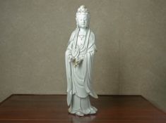 A LARGE BLANC DE CHINE PORCELAIN FIGURE OF GUANYIN