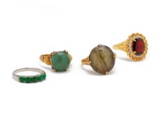 A GROUP OF FOUR GEM SET RINGS