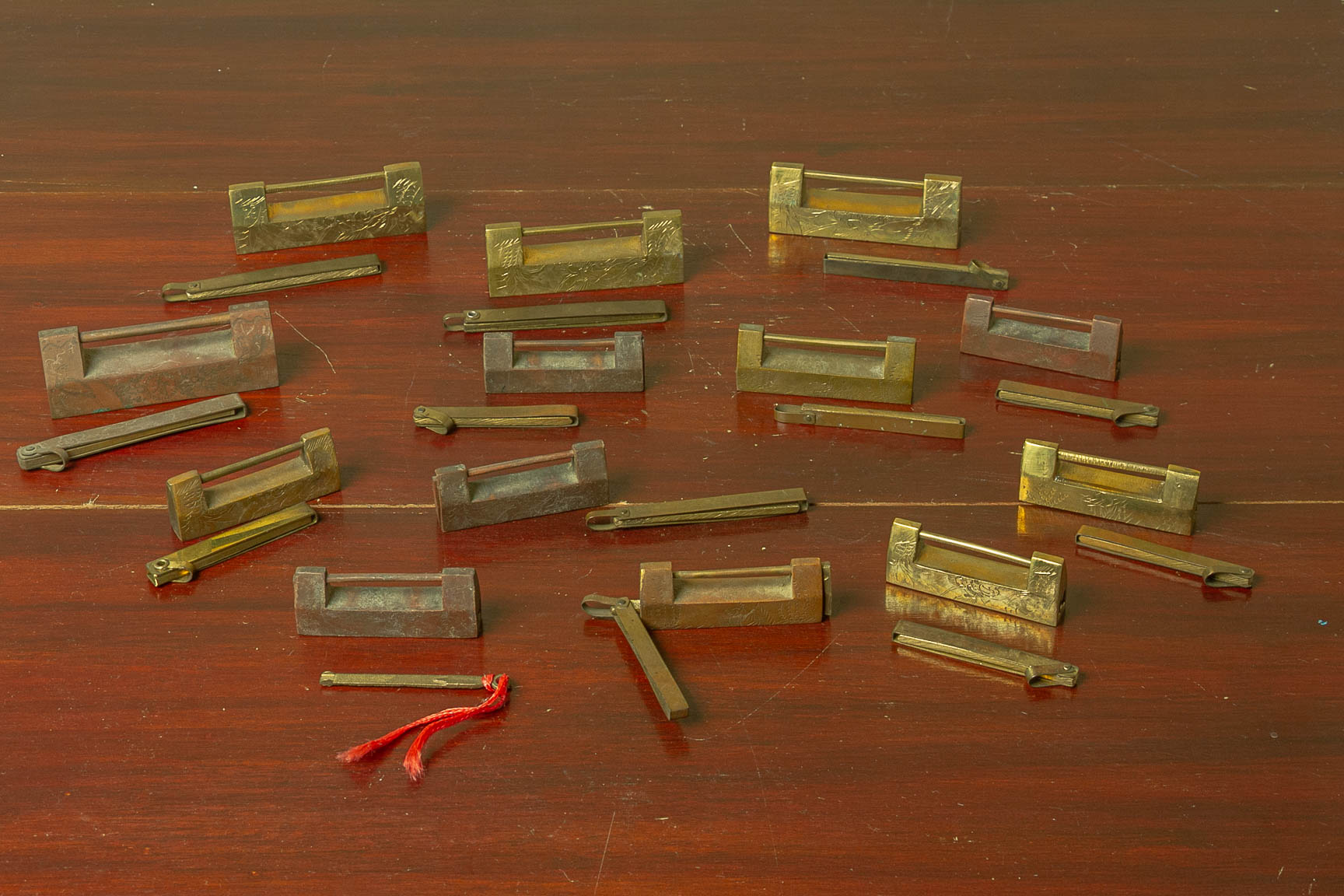 A COLLECTION OF CHINESE BRASS LOCKS