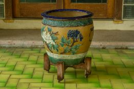 A GLAZED POTTERY PLANTER