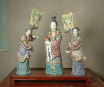 A GROUP OF THREE FAMILLE ROSE PORCELAIN FIGURES OF LADIES