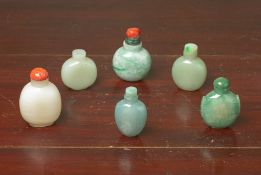 A GROUP OF SIX JADE SNUFF BOTTLES