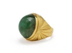 A LARGE EMERALD CABOCHON RING