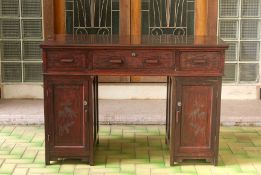 A TWIN PEDESTAL HARDWOOD DESK