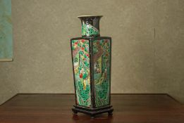 A RETICULATED FAMILLE VERTE SQUARE SECTION VASE