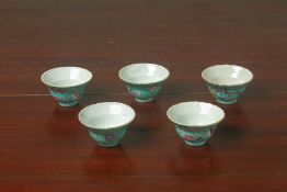 A MATCHED SET OF FIVE PERANAKAN TURQUOISE GROUND TEA BOWLS
