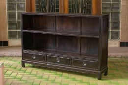 A BLACKWOOD OPEN BOOKCASE