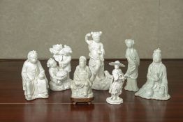 A MIXED GROUP OF BLANC DE CHINE PORCELAIN FIGURES