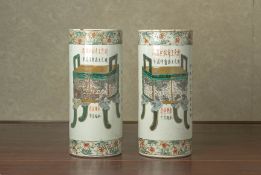 A PAIR OF FAMILLE VERTE CYLINDIRCAL VASES