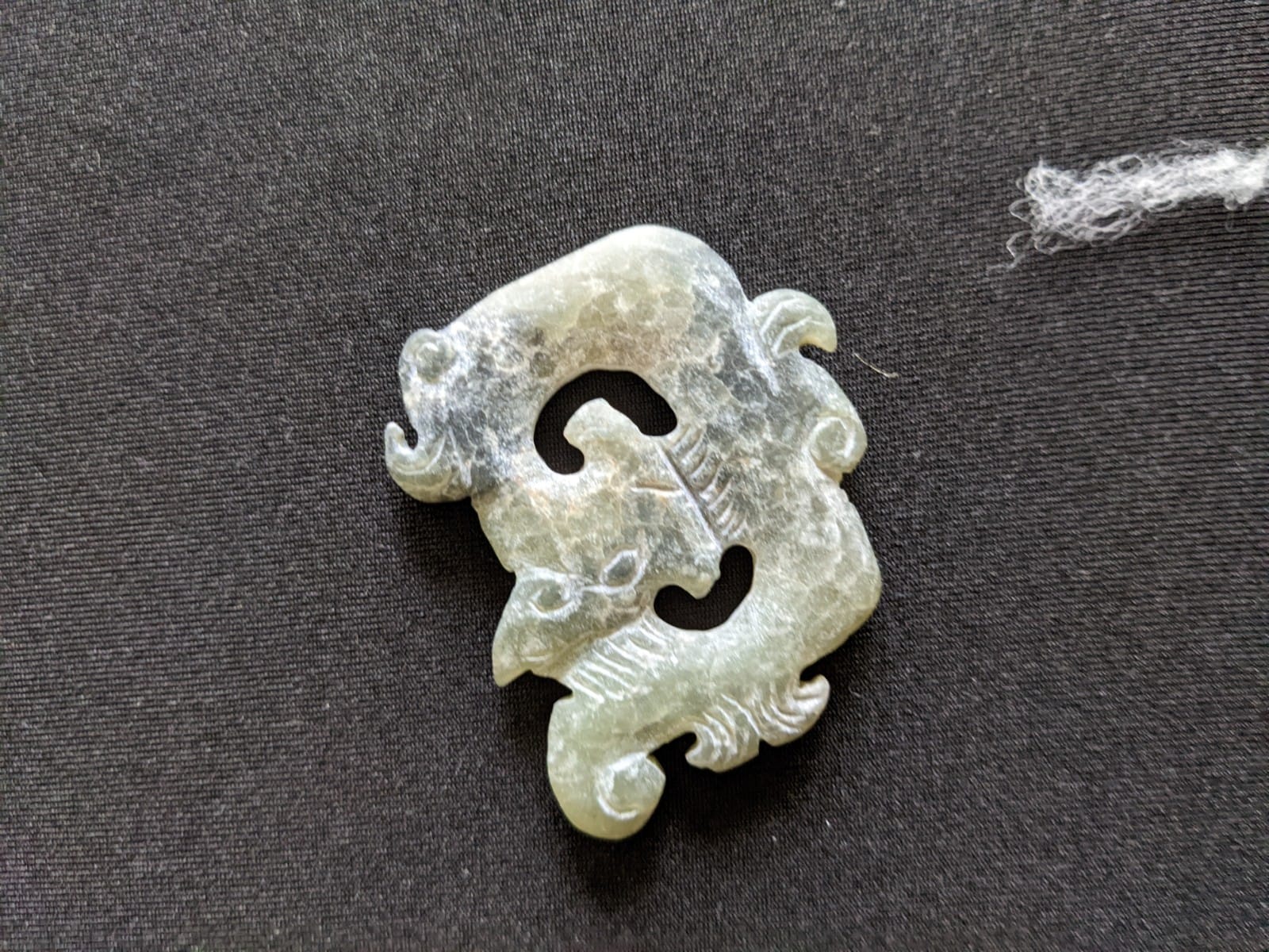 A GROUP OF ARCHAIC STYLE JADE PENDANTS - Image 18 of 21