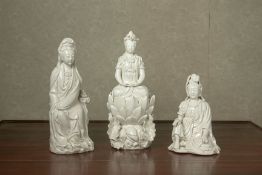 THREE BLANC DE CHINE PORCELAIN FIGURES OF GUANYIN