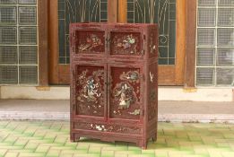 A CINNABAR LACQUER AND HARDSTONE INLAID SIDE CABINET