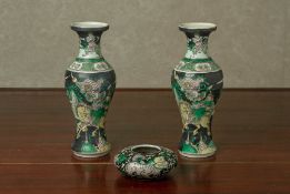 A PAIR OF FAMILLE NOIRE BALUSTER VASES