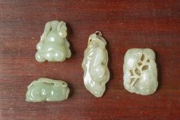 A GROUP OF FOUR JADE CARVINGS