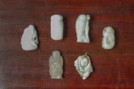 A GROUP OF SIX FIGURAL JADE CARVINGS