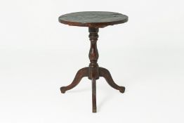 A RUSTIC CHINESE ELM TRIPOD TABLE