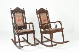 A PAIR OF INDONESIAN CARVED WOOD ROCKING CHAIRS