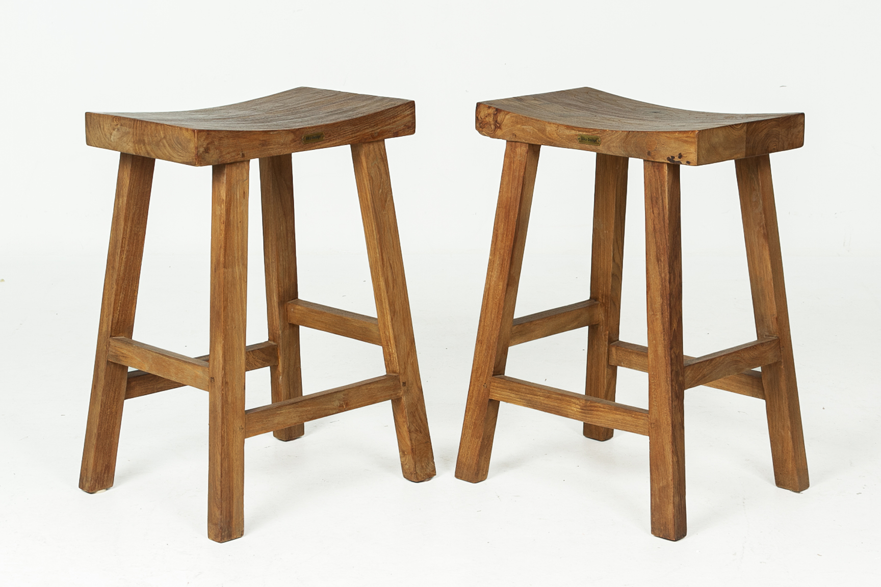 A PAIR OF HARDWOOD BAR STOOLS BY SIKA DESIGN