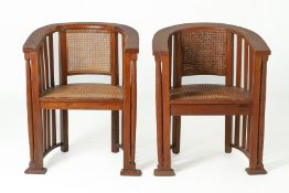 A PAIR OF RATTAN TUB CHAIRS