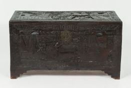 A CARVED WOOD CAMPHOR LINED CHEST