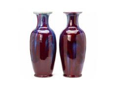A PAIR OF LARGE FLAMBE GLAZED BALUSTER VASES