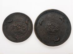 TWO CAST METAL DRAGON PLATES