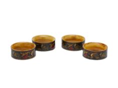 A SET OF FOUR TUNBRIDGE WARE NAPKIN RINGS