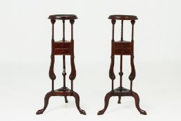 A PAIR OF MAHOGANY JARDINIERE STANDS
