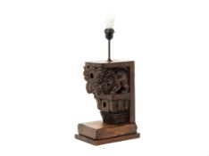 A CARVED WOOD CORBEL TABLE LAMP