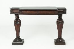 A CARVED ROSEWOOD CONSOLE TABLE