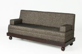 A CONTEMPORARY GREY UPHOLSTERED SOFA