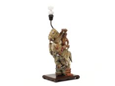 AN INDIAN CARVED AN PAINTED WOOD TABLE LAMP