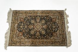 A KASHMIR SILK RUG