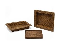 A GROUP OF RATTAN WOVEN TRAYS