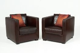 A PAIR OF BROWN LEATHER CLUB CHAIRS