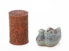 A CARVED BOXWOOD CYLINDRICAL BOX AND A CERAMIC CHICKEN GROUP