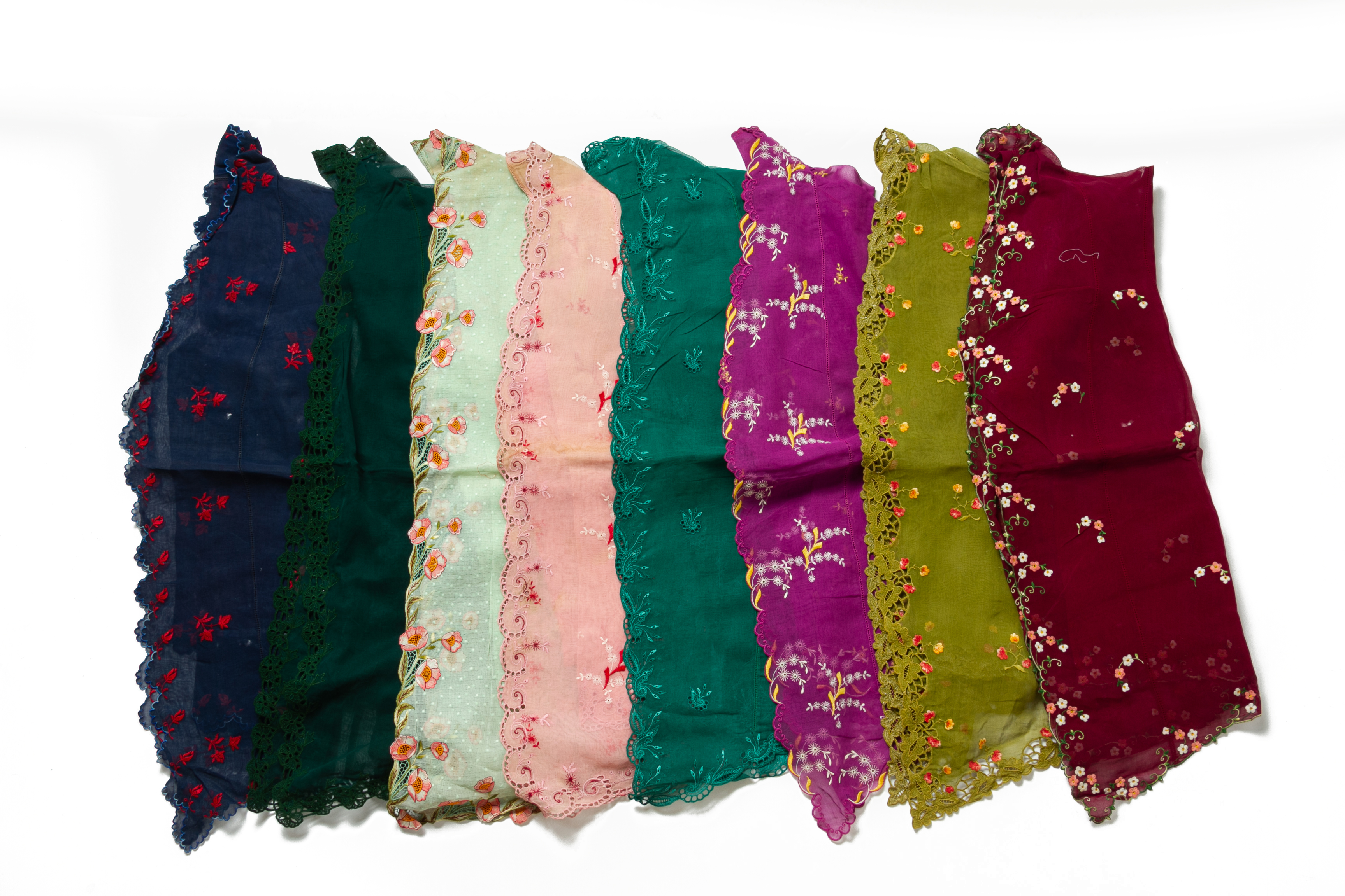 EIGHT EMBROIDERED KEBAYAS