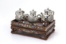 A PART TEA SERVICE ON MOTHER OF PEARL HARDWOOD STAND