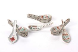A COLLECTION OF TWENTY-TWO PORCELAIN SPOONS