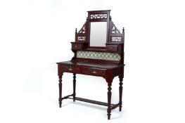 A CARVED WOOD DRESSING TABLE